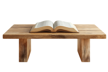 An open book rests on a rough-hewn wooden table with a black background