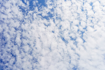 Cloudy blue sky abstract background, blue sky background with tiny clouds
