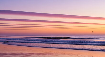 Peaceful Sunrise Over Ocean Waves With Streaky Clouds