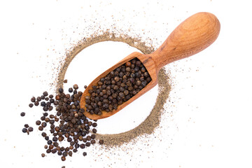 Black peppercorns and ground black pepper powder on white background