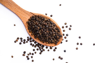 Black peppercorns on white background	