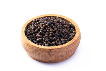 Black peppercorns on white background	