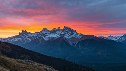 Fototapeta premium Serene Peaks at Dawn. A Symphony of Fire and Ice, Mountains Under Pastel Sky.