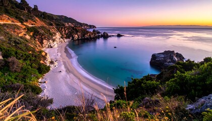 A scenic coastal vista showcases a secluded beach. Turquoise waters lap against a sandy shore, flanked by rugged cliffs and lush greenery under a vibrant sunrise