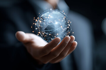 A person is holding a globe in their hand