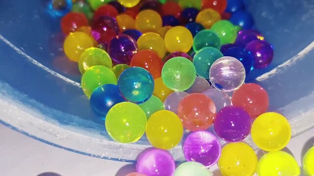 Colorful Translucent Water Beads Orbeez Close Up Cascade