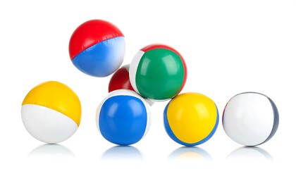 A collection of brightly colored spherical objects with segmented panels against a white background. Several are in motion
