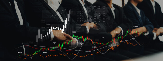 A professional business meeting focused on financial growth, showcasing data visualizations and...