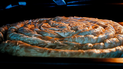Traditional Turkish Type Pastry 'Borek' Baking in Oven