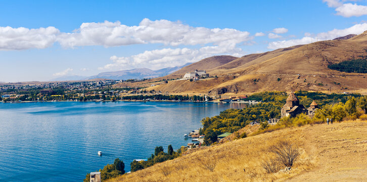 View of Lake Sevan and ancient monastic complex of Sevanavank in Armenia
