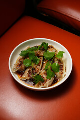 Steamed Dumplings in Chili Oil with Cilantro