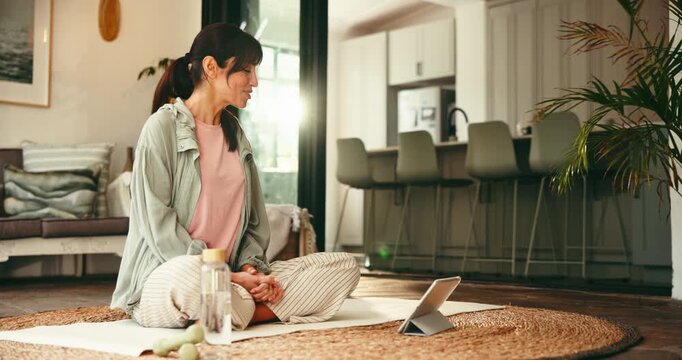 Woman, wave and video call on tablet for yoga, online class and introduction for personal trainer. Mature, person or digital webinar for fitness, training tips and guidance for learning yogi at house