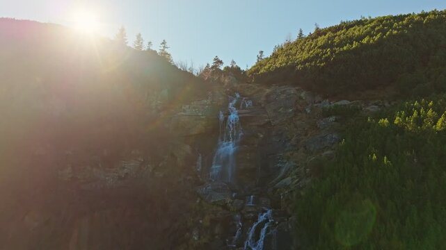 This video showcases the serene beauty of waterfalls in forests