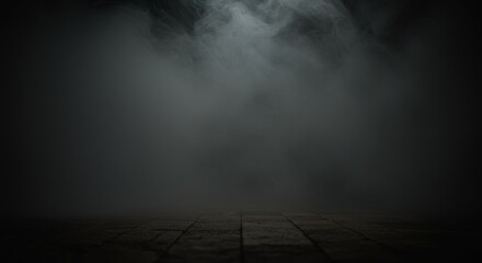 A dark, fog-filled scene with a thick layer of smoke creating a mysterious and moody atmosphere.