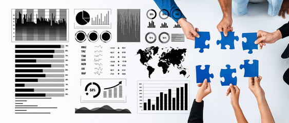 A diverse team collaborates in an office setting, holding puzzle pieces that symbolize strategic problem solving, surrounded by various graphs and data analytics visualizations. Axiom