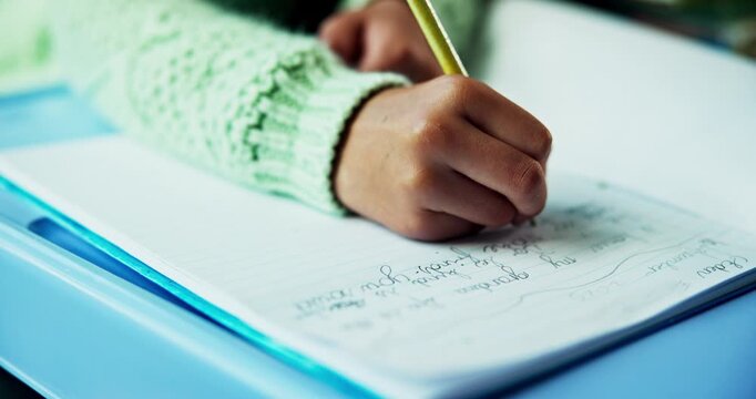 Hand, table and writing in book with pencil, diary entry and homework for school. Person, creative story and notebook at desk with education assignment, student and learning task for academic essay.