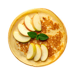 Overhead shot of a golden crepe topped with apple slices and mint against a black background