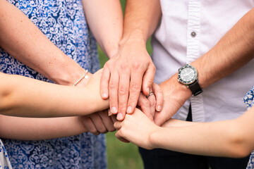 Close-Up of Family Holding Hands, Unity, Love, and Teamwork