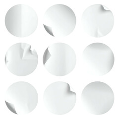 Nine circular white blank stickers, some with curled corners, against a black background