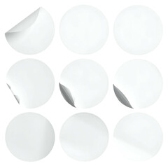 A grid of nine blank, white circular stickers, some with peeled corners on a black background