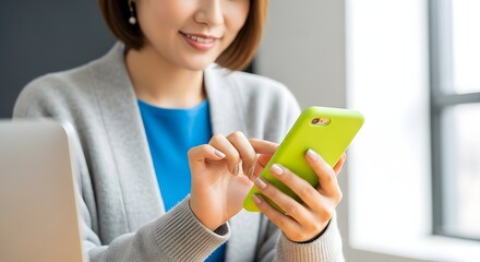 Smiling Woman Using a Smartphone