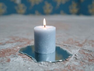 Simple White Candle on Reflection Surface with Blue Background