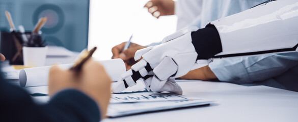 A scene depicting a human and a robot collaborating in a modern office, showcasing the integration of advanced technology with human skills, emphasizing innovation.Noogenesis