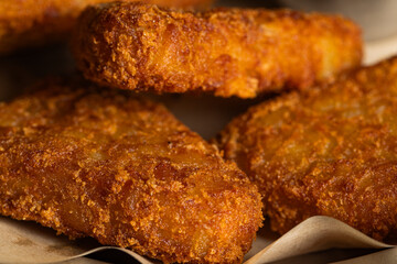 Crispy Fried Cheese Sticks or Hash Browns with White Dipping Sauce