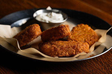 Crispy Fried Cheese Sticks or Hash Browns with White Dipping Sauce