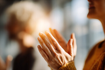 Anonymous triumph through soft-focus celebration, anonymous figures capturing accomplishment joy, anonymous moment represents universal startup success