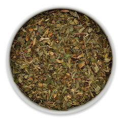 Freshly dried mint leaves in a white ceramic bowl, viewed from above, commonly used for preparing herbal tea blends