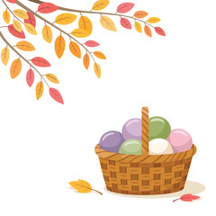 Autumn basket overflowing with colorful yarn and falling leaves