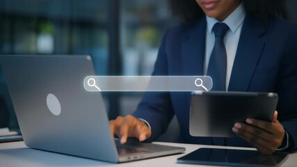 Businesswoman interacting with digital search bar interface on futuristic screen laptop and tablet technology 4k - Powered by Adobe