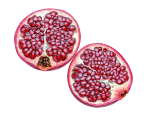 Sliced pomegranate halves showcase juicy, deep red arils on black