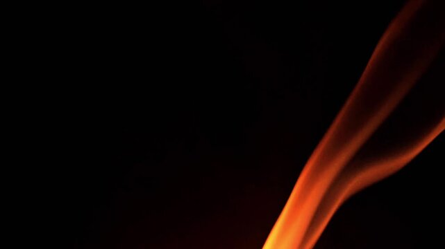 Red smoke on black background, slow motion cinematic video 