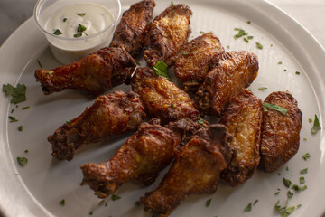 Golden fried chicken pieces on a plate, showing rich texture and seasoning, reflecting comfort food culture, protein nutrition, and the universal appeal of homemade fried dishes.