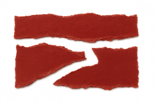 Torn red paper pieces with rough edges, ripped craft paper separating, creating negative space cutout frames