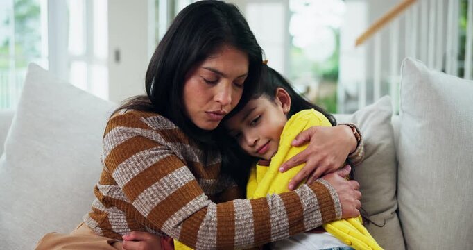 Hug, mother and child with serious conversation on sofa, listening or understand for family bonding. Support, care and woman embrace or daughter in home for connection, trust and love in relationship