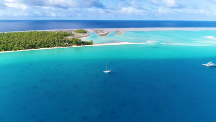 Luxury resort photo of Bora Bora tropical paradise islands with palm trees, yacht, boat. Aerial...