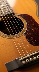 Acoustic Guitar Close-Up - Strings, Soundhole, and Pickguard Detail.