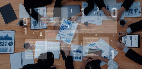 A dynamic group of professionals engaged in a collaborative meeting, analyzing data charts and...