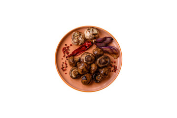 Grilled mushroom pieces, a vegetarian healthy meal with sauce. Barbecue mushroom halves