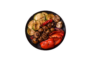 Grilled vegetables, bell peppers, mushrooms, and zucchini, a vegetarian meal. Grilled vegetables