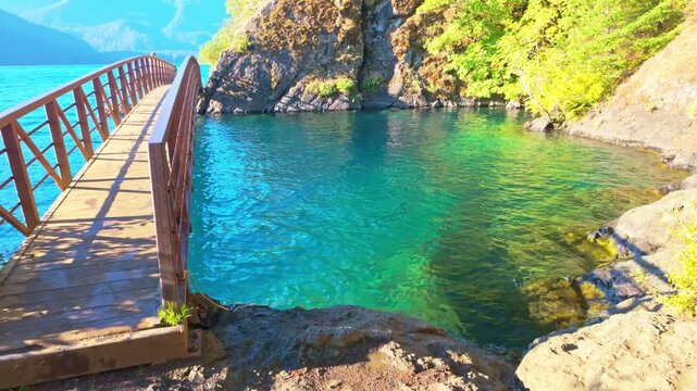 A beautiful view of the clear waters at Devil's Punchbowl, a famous landmark on Lake Crescent in Olympic National Park
