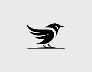 The image presents a sleek black bird logo captured in a dynamic silhouette, evoking themes of freedom, agility, and the beauty of nature.