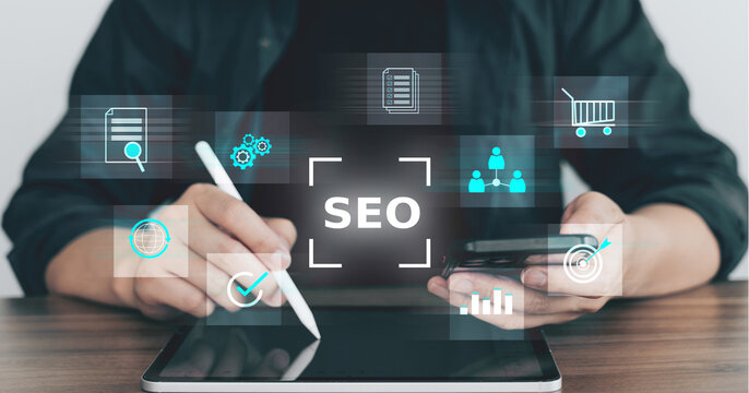 Hands working on tablet with floating SEO and digital marketing icons, representing online visibility, optimization, and analytics tools.