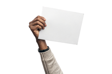 se-up of a hand holding up white paper. Cutout. Transparent. Message. Protest. Demonstration. Opinion. Statement.