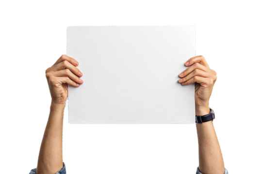 se-up of a hand holding up white paper. Cutout. Transparent. Message. Protest. Demonstration. Opinion. Statement.