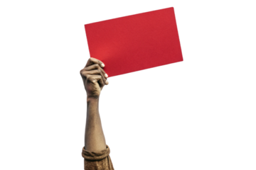 se-up of a hand holding up red paper. Cutout. Transparent. Message. Protest. Demonstration. Opinion. Statement.