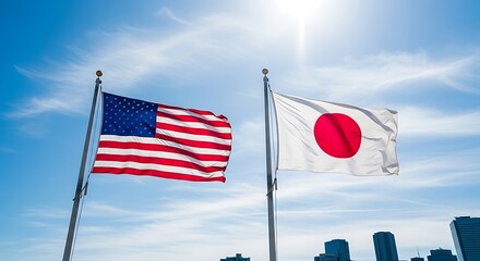 United States and Japan Flags Waving in the Sky.